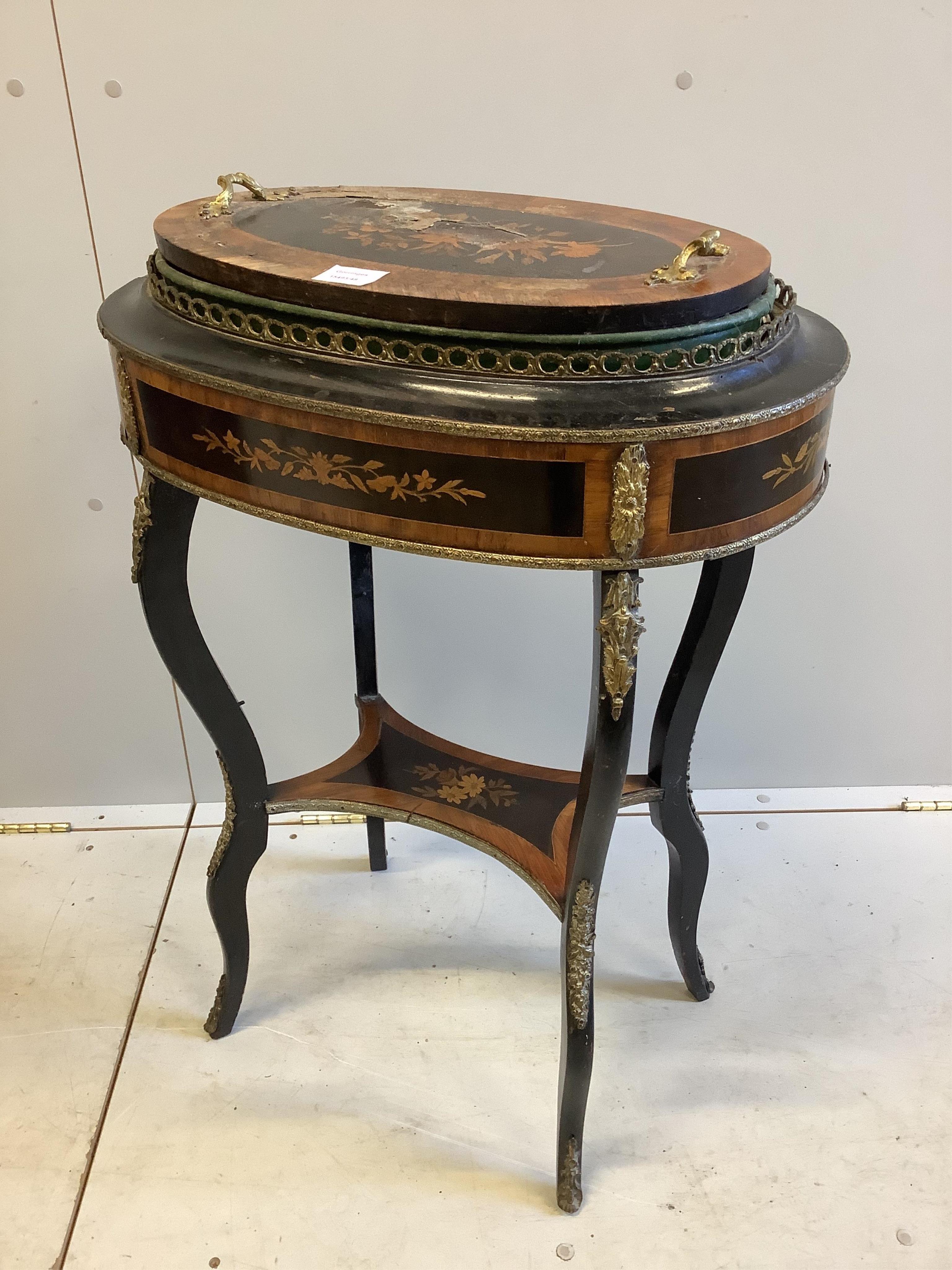 A mid 19th century French ebonised, kingwood and floral marquetry inlaid jardiniere table, width 58cm, depth 38cm, height 85cm. Condition - poor